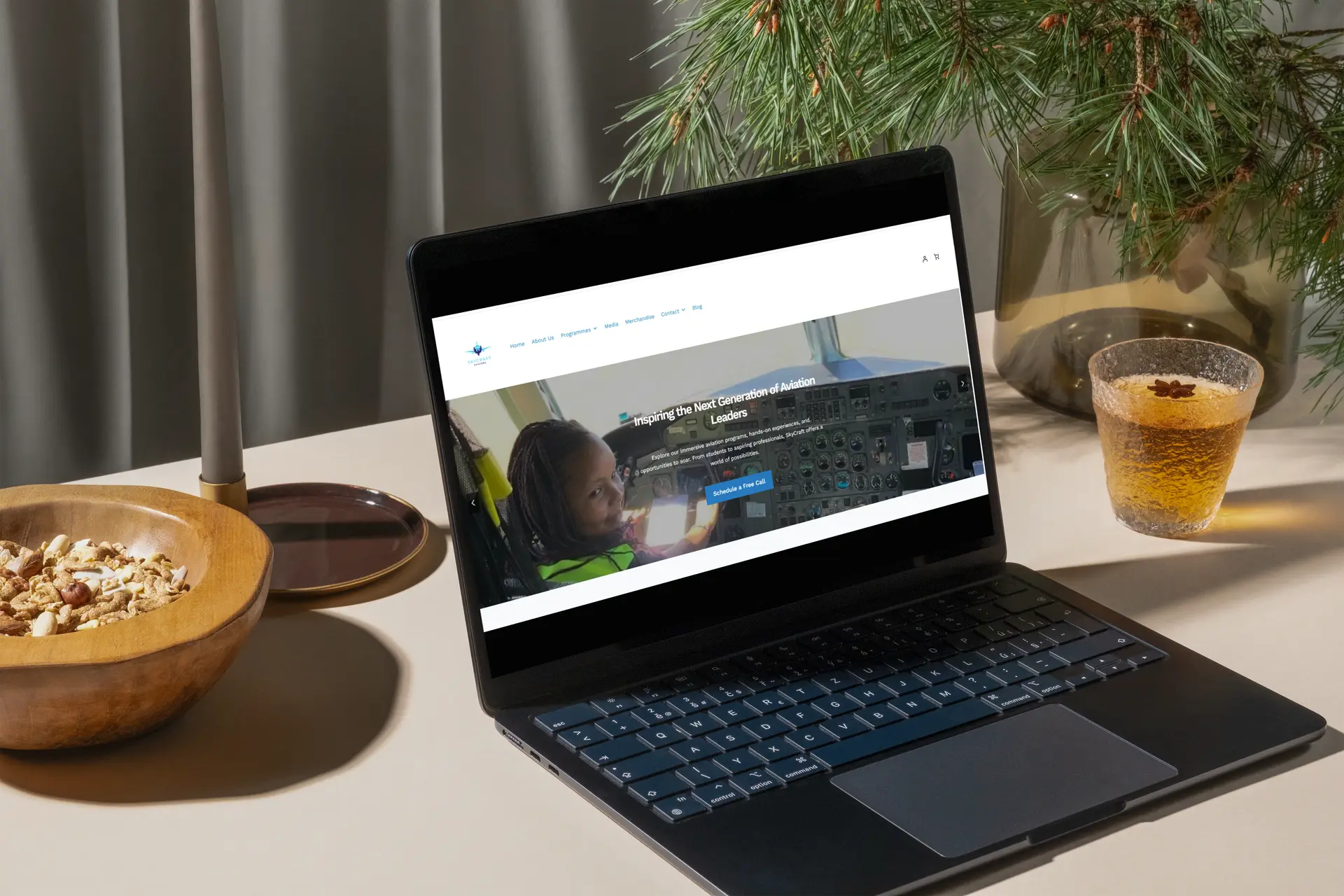 Laptop mockup showing Skycraft Africa’s redesigned website — a professional, responsive aviation and drone solutions platform with clean visuals and optimized performance.