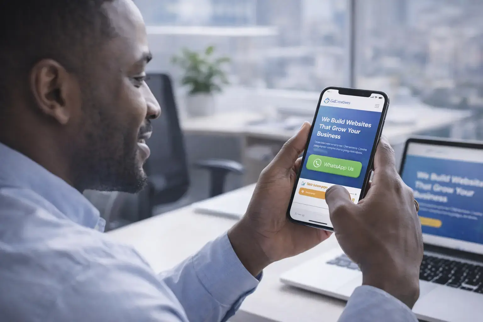 Kenyan business owner contacting a company via a website WhatsApp button on a smartphone